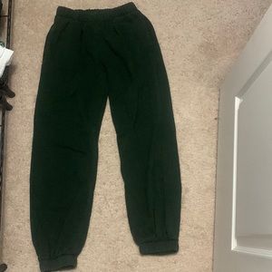 dark green sweatpants